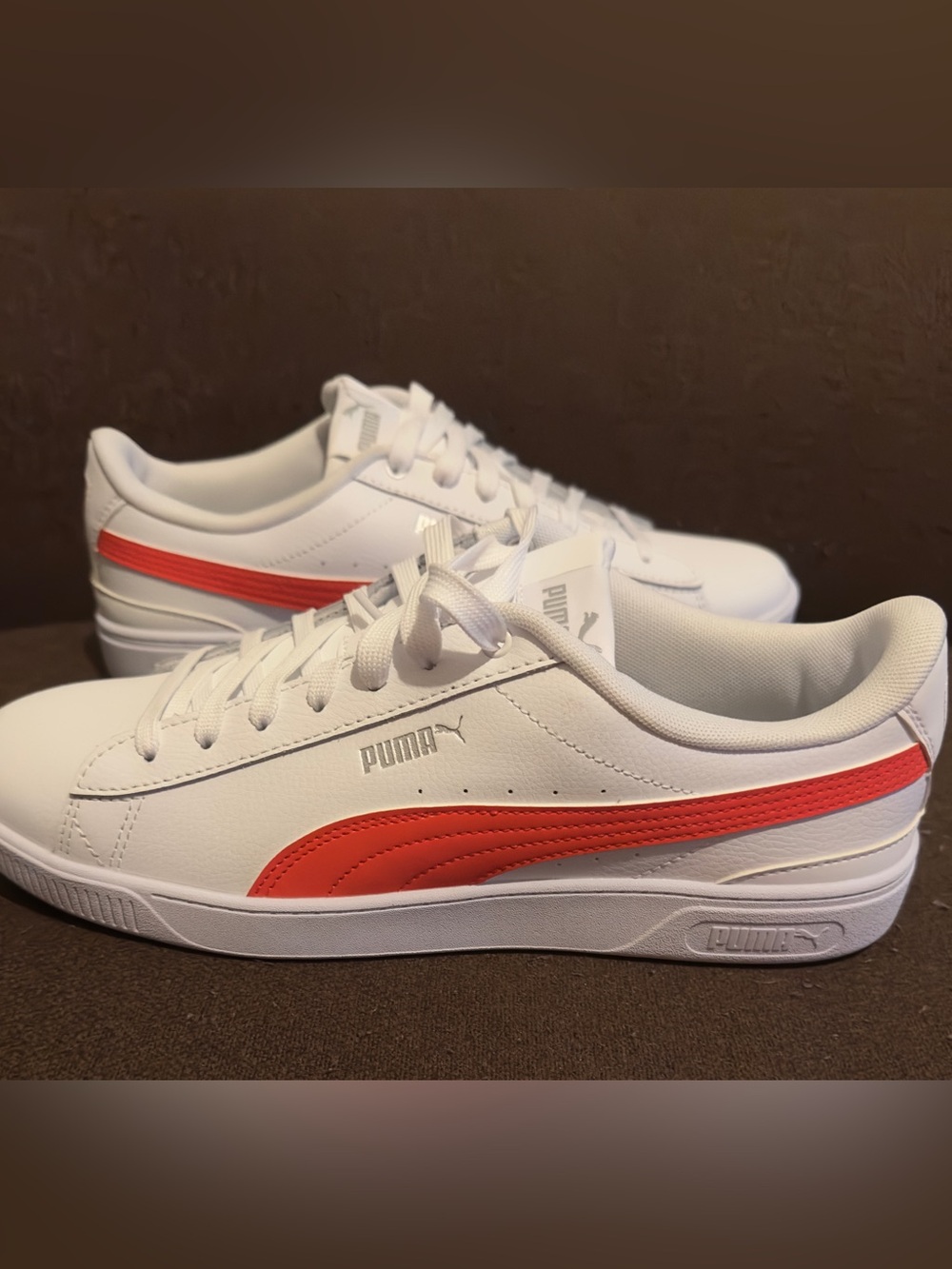 BRAND NEW Puma Women's Soft Foam White &
Sneakers with Orange Stripes. Size 11.